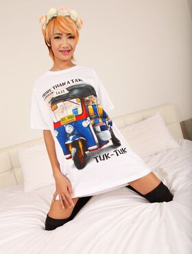 Asian cutie Omsin poses for the camera in a shirt and knee socks