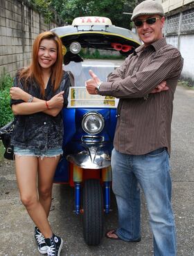 Asian cute babe Noy takes a ride with a stranger on his mini taxi