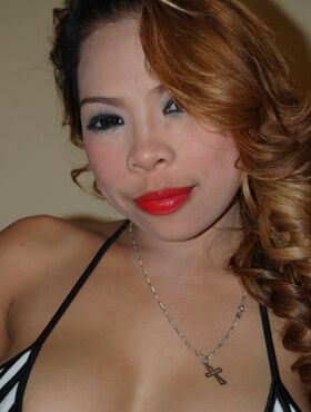 Big mouth Asian party girl Amanda poses with her beautiful big tits bare