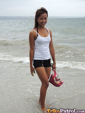 Slim Filipina girl Mhikaella undresses before fucking a sex tourist in hotel