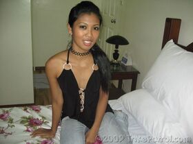 Pinay amateur spreads her legs to display her shaved pussy after disrobing