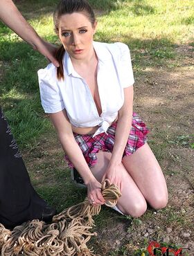 Schoolgirl Samantha Bentley finds herself suspended from ropes in the woods