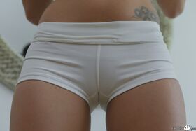 Big tit Latina Jasmine Caro strips off her micro bikini in front of mirror