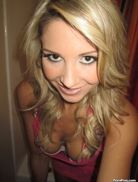 Blonde girlfriend Natalie Vegas showing off her new boobs on toilet seat