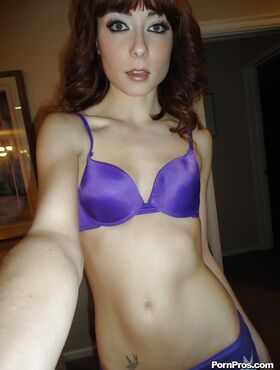 Skinny redhead ex-girlfriend Zoe Voss taking selfies while taking off clothes