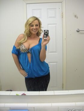 Ex-girlfriend Stephanie Blaze takes mirror selfies while getting undressed