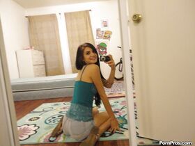 Slender female Zoey Kush ditching her shorts and top while taking selfies