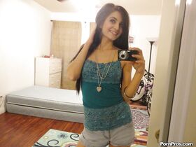 Slender female Zoey Kush ditching her shorts and top while taking selfies