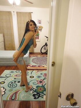 Slender female Zoey Kush ditching her shorts and top while taking selfies