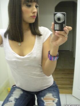Ex-girlfriend Nadia Aria undresses in bathroom mirror while taking self shots