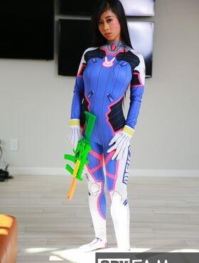 Cosplay girl Jade Kush doffs costume to show big natural tits & hairy pussy