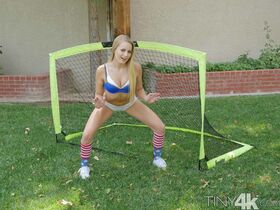 Soccer beauty Scarlett Sage strips and spreads her coochie on the field