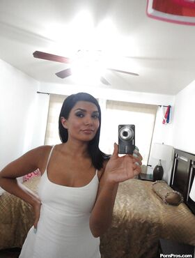 Glamour brunette Shazia Sahari makes a self shot of awesome body and big ass