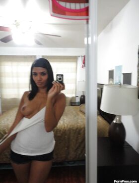 Glamour brunette Shazia Sahari makes a self shot of awesome body and big ass