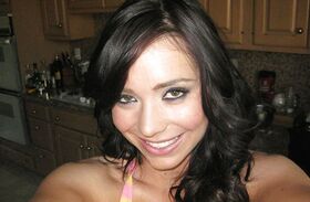 Brunette ex-girlfriend Beverly Hills flashing big natural tits in kitchen