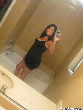 Dark haired ex-gf Sarah Copafeel does a slow striptease in the bathroom