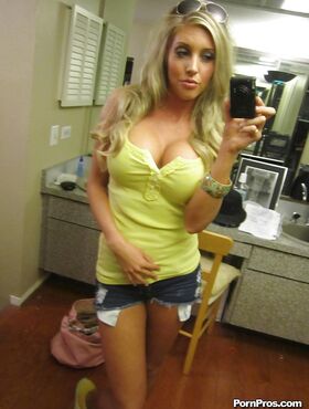 Blonde girlfriend Samantha Saint reveals her big tits and an excellent ass