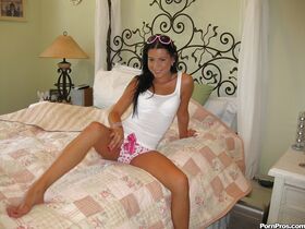 Chic girlfriend in shorts Tanner Mayes loves spreading legs on bed