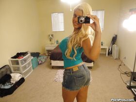 Sultry Latina chick Bridgette B stripping during self shots in mirror