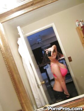 Hot ex-gf Loni Evans taking selfshots of her perfect tits in bathroom mirror
