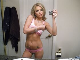 Blonde girlfriend Taylor Tilden taking nude selfies of her phat ass in mirror