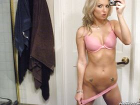 Blonde girlfriend Taylor Tilden taking nude selfies of her phat ass in mirror