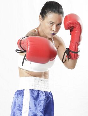 Asian mature Dana Vespoli reveals her fake tits and shows her boxing skills