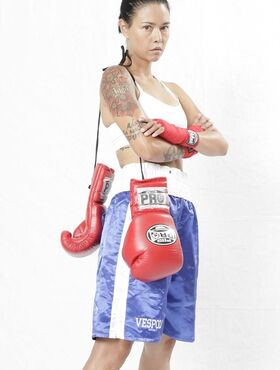 Asian mature Dana Vespoli reveals her fake tits and shows her boxing skills