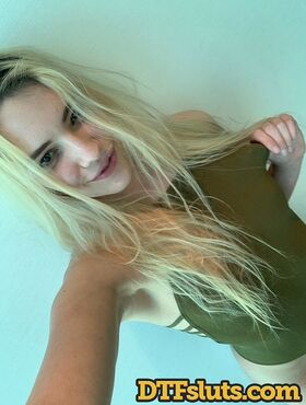 Blonde teen Kenna James strips her clothes and flaunts natural tits in a solo