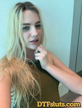 Blonde teen Kenna James strips her clothes and flaunts natural tits in a solo