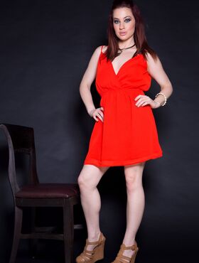 Pornstar in a sexy red dress Jessica Ryan strips to show big tits & pink twat