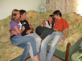 Teen girls and their boyfriends divest themselves of jeans before a foursome