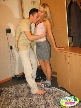 Young blonde is stripped to her socks before intercourse with her boyfriend