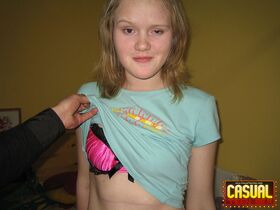 Young looking girl has her clothes removed by her boyfriend before they fuck