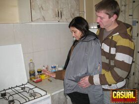 Teen lovers engage in a hard couples fuck in the kitchen
