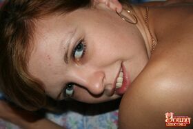 Hot teen Simona takes off her silky robe and flaunts her tasty muff
