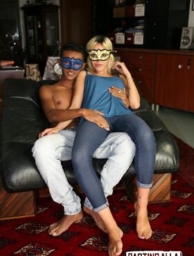 Young masked couple doesn't want to show faces fucking at photo session
