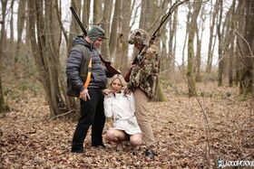French blonde Alix Feeling poses and gives a double blowjob in the woods
