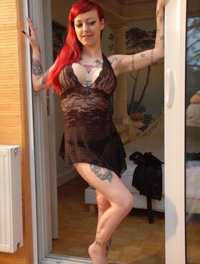 Tattooed French chick Eva Lange with red hair likes when hard cock drills twat