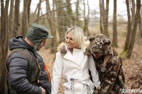 Blonde French hottie Alix Feeling gives a double blowjob in the woods