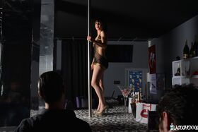 Hot French chick Yasmine seducing two guys while pole dancing and using dildo