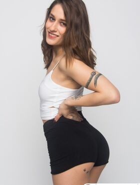 Spanish tattooed vixen Alexa Nasha strips and plays with a big fat dildo