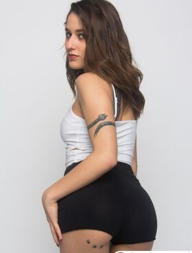 Spanish tattooed vixen Alexa Nasha strips and plays with a big fat dildo