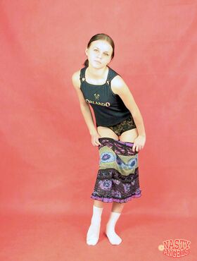 Petite brunette Katya strips black lace underwear to shoe teen pussy in socks