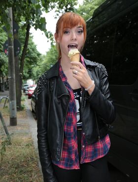 Sexy German redhead teases with ice cream and flashes her cute boobs in public