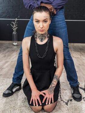 Brunette babe Tabitha Poison gets chained and gets blacked anally