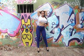 Huge titted Latina Marta La Croft peels spandex pants for big ass garden bang