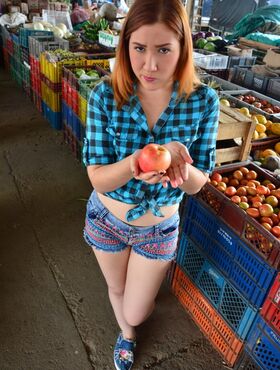 Girl in a plaid blue shirt takes us to a local market for a fruit shopping