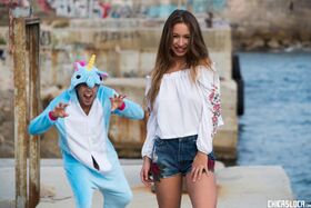 Boy in funny outfit satisfies comely girlfriend Taylor Sands on the pier