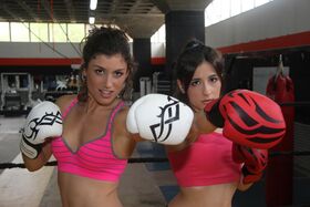 Spanish babes entered the ring not for fighting but to flash their charms